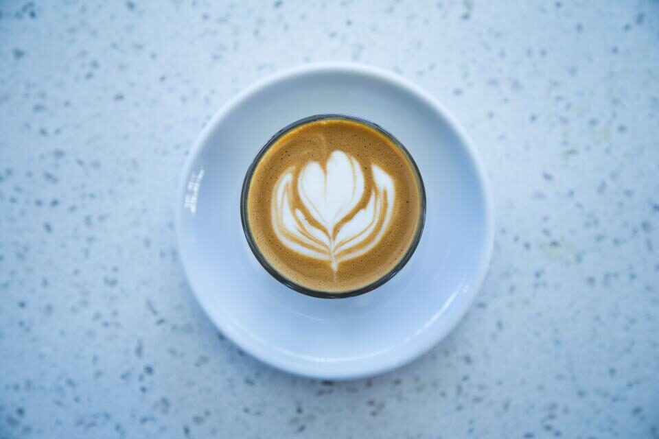 Coffee with milk in a ceramic cup