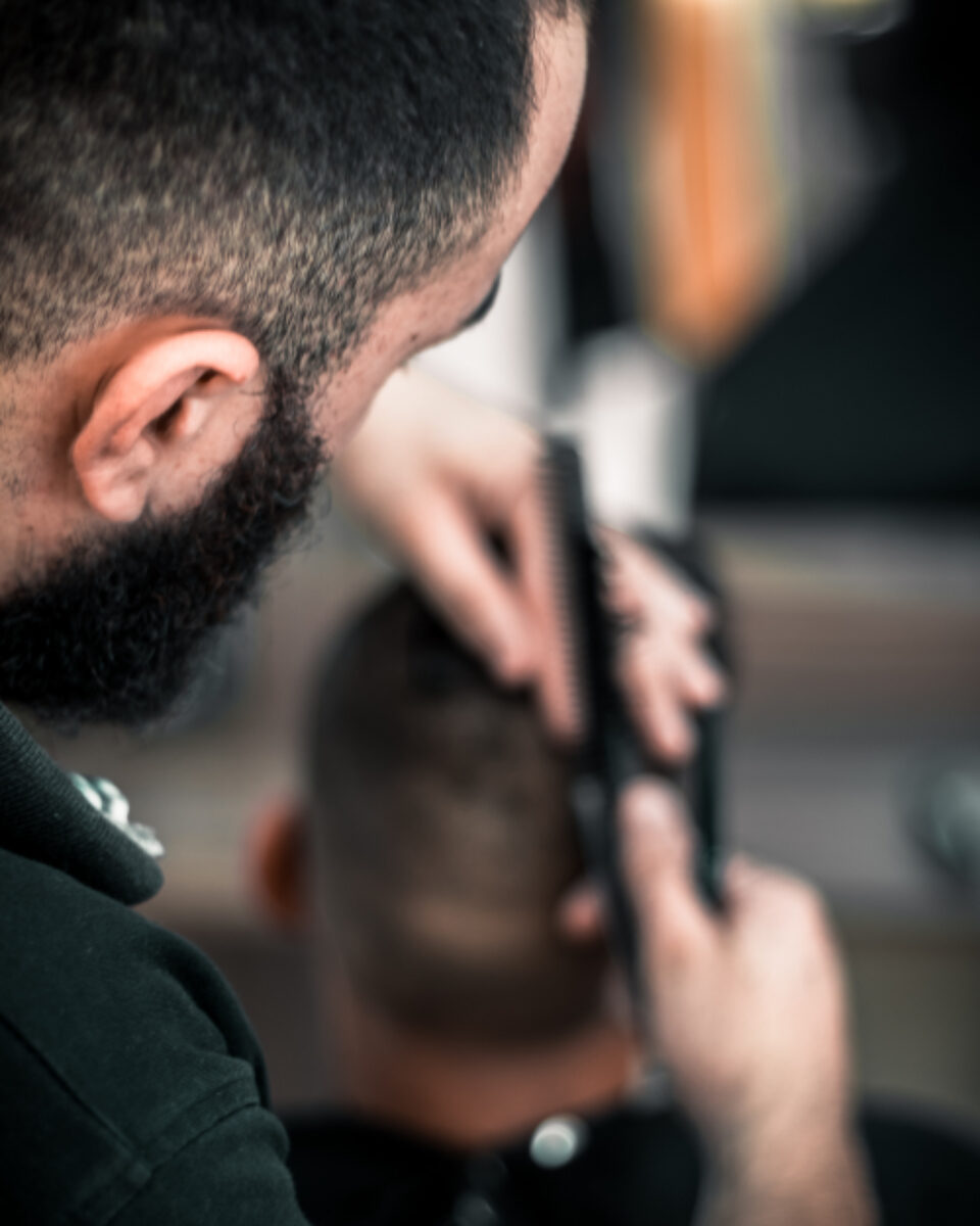 Client in the chair getting a fade