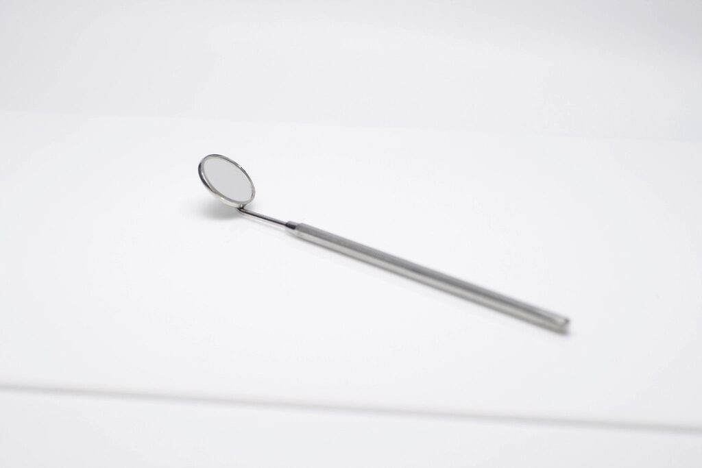 Dental mirror on a clean surface