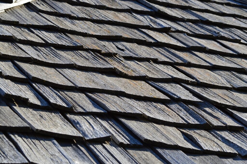 Overlapping grey roof shingles