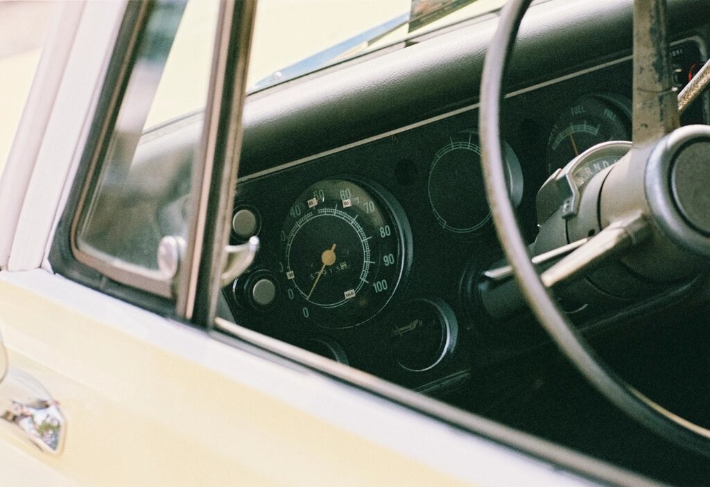 View through the side window of a vintage car